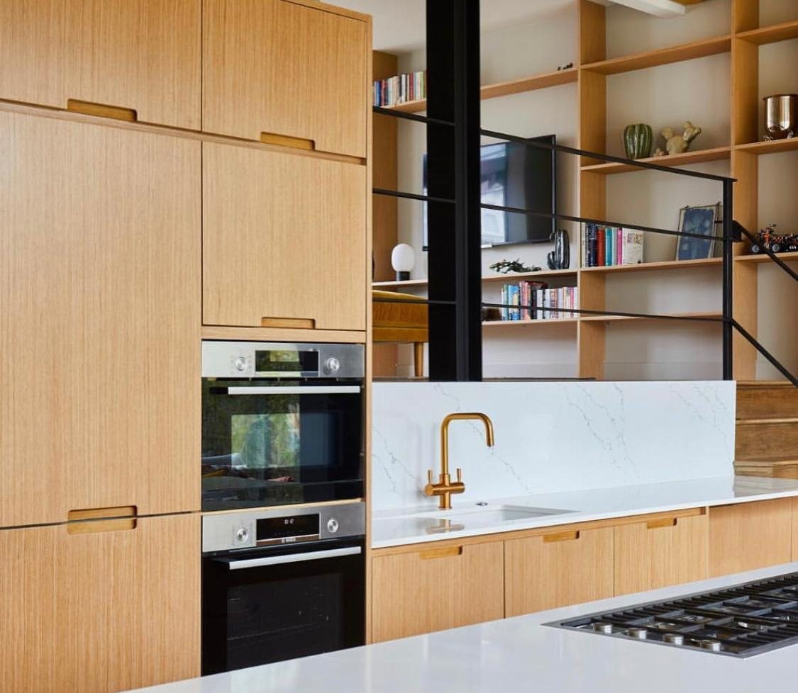 Kitchen with timber fronted units