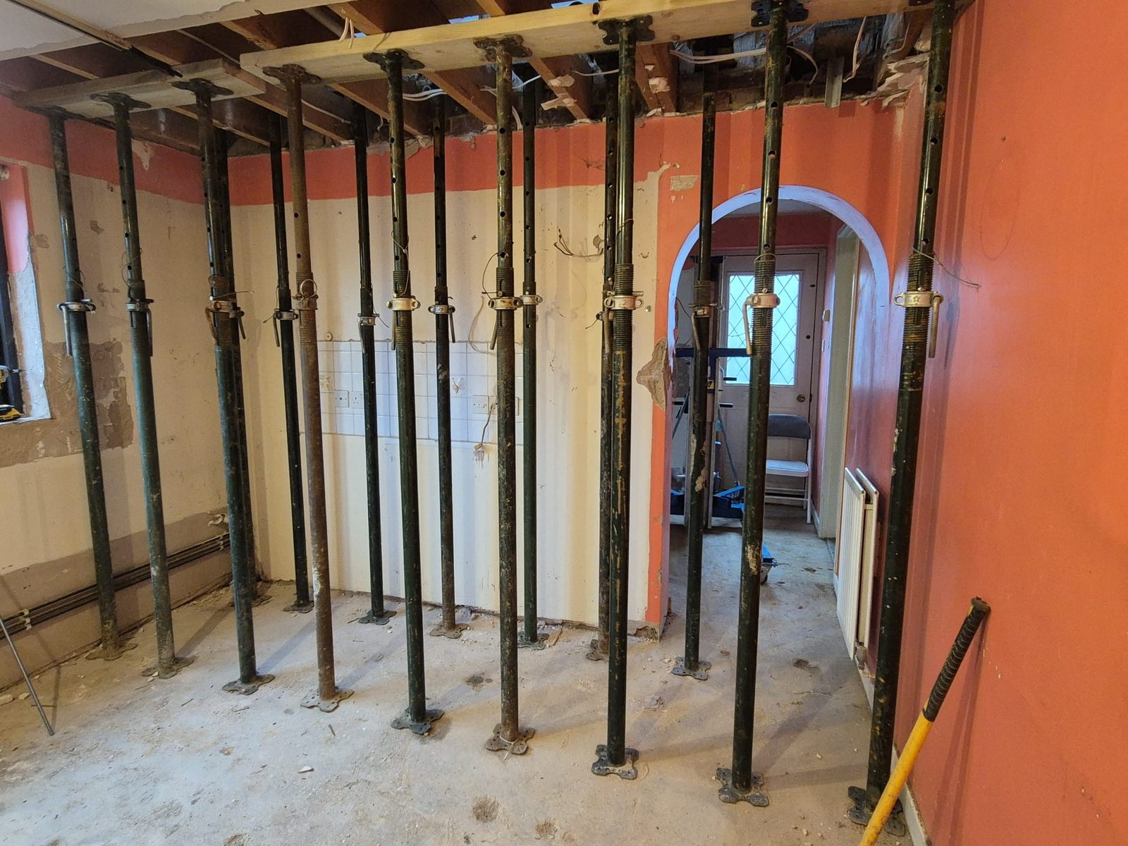 Temporary props carrying the floor above