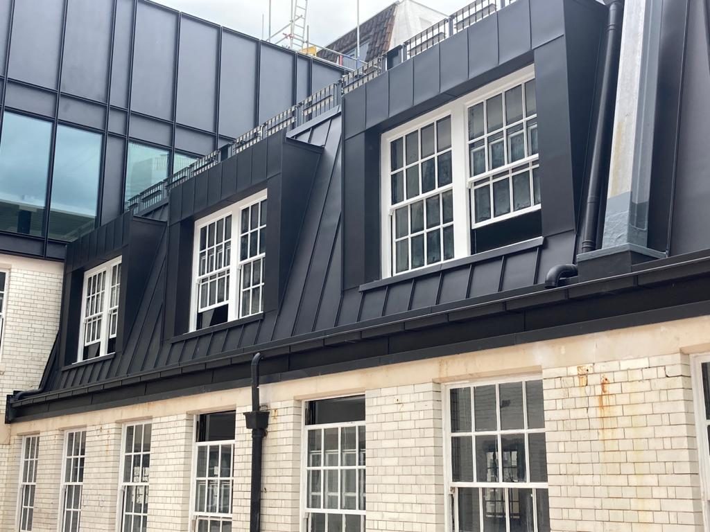 Zinc clad dormers with sash windows
