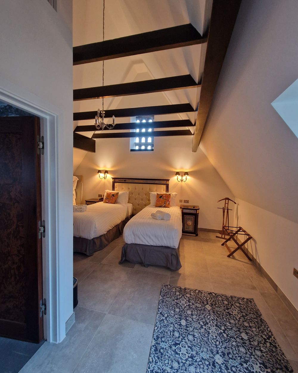 Bedroom under the beams after the refurbishment