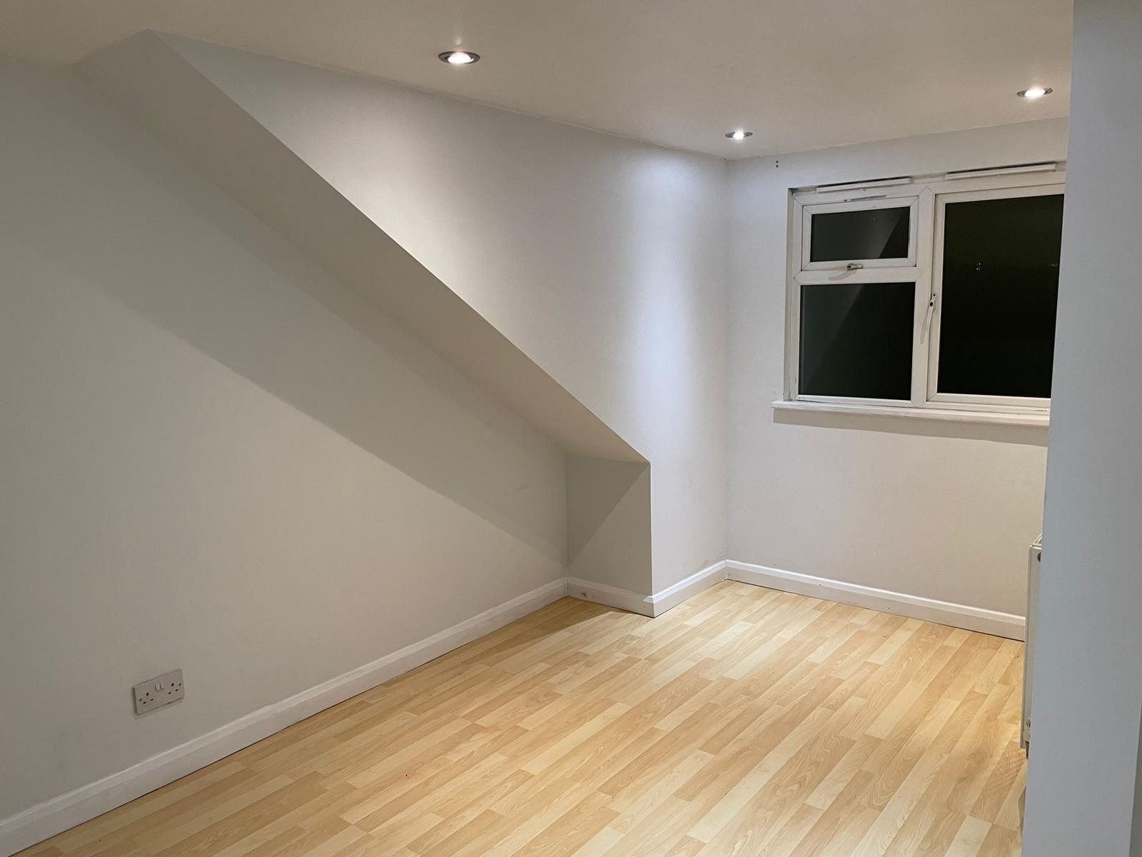 Room with a sloping ceiling
